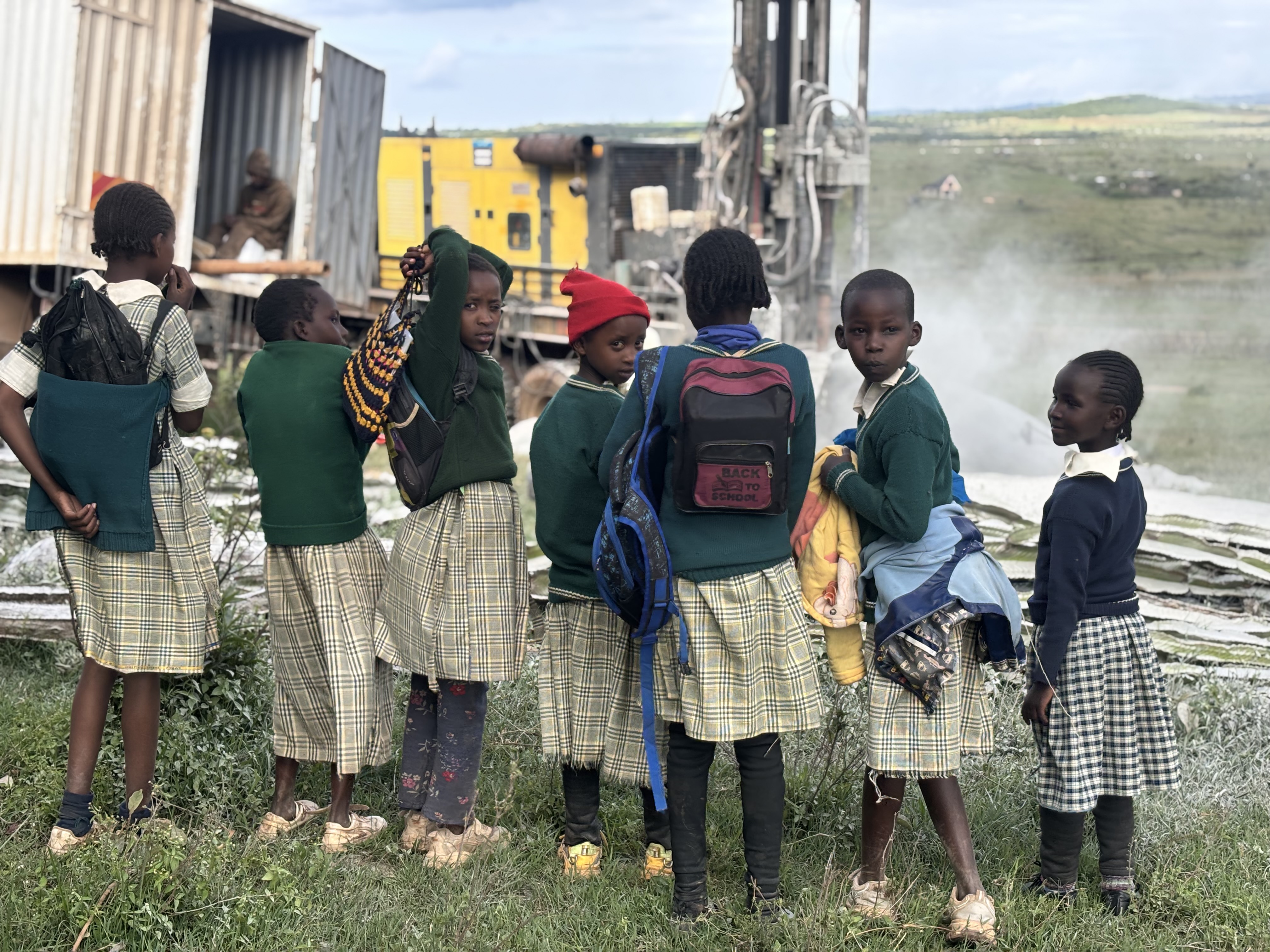 Schoolchildren watching Kisima drill at Chumvi